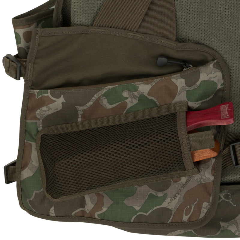 Youth Time & Motion Easy-Rider Turkey Vest: Camouflage bag with detachable seat cushion, pockets for calls, shell loops, and adjustable straps.