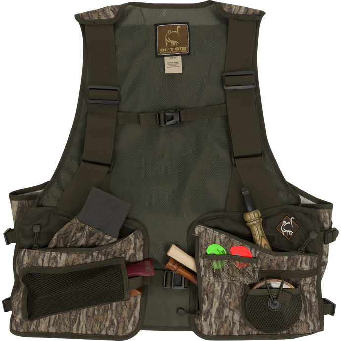 A youth-sized Time & Motion Easy-Rider Turkey Vest with detachable Magnattach™ padded rear seat cushion, zippered front pockets, and quick-draw shell loops. Adjustable chest/side straps for all sizes.