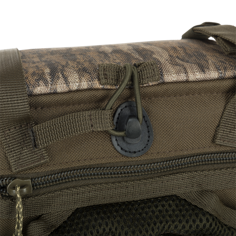 A lightweight Turkey Chest Pack made with durable materials for your hunting adventures. Features removable bino harness, multiple pockets, and stowable rain fly.