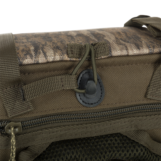 A lightweight Turkey Chest Pack made with durable materials for your hunting adventures. Features removable bino harness, multiple pockets, and stowable rain fly.