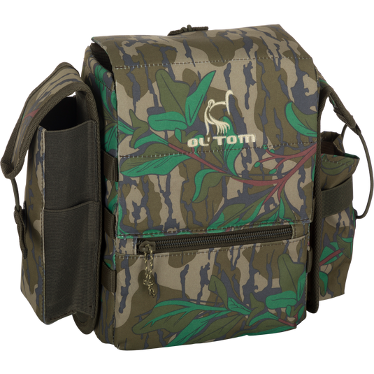 A lightweight Turkey Chest Pack made of durable 600D Polyester rip-stop with PVC backing. Features include a removable bino harness, multiple pockets and loops, and a stowable rain fly for complete protection. Perfect for your next hunting trip.