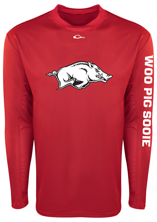 A red long-sleeved Arkansas L/S Performance Shirt with a pig logo. Provides UPF 50+ sun protection and features breathable mesh on the back and underarms for all-day comfort. Ideal for outdoor activities like hunting, fishing, and more.