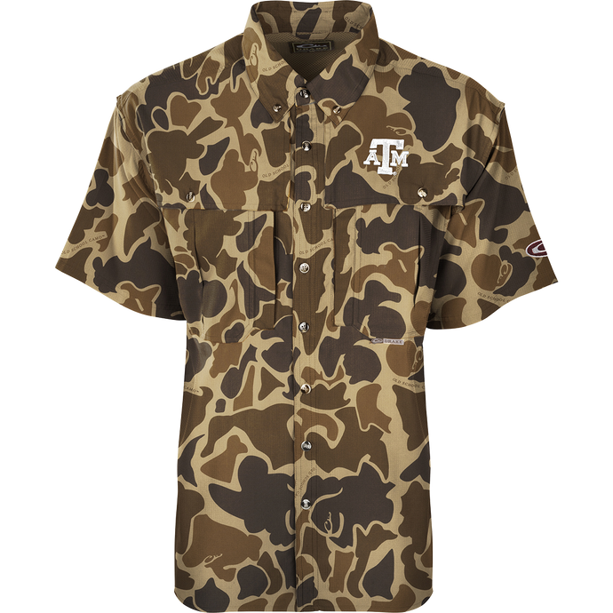 Texas A&M S/S Flyweight Wingshooter: Camouflage shirt with logo, designed for warm-weather outdoor activities. Quick-drying, moisture-wicking, and breathable. Features vented back, UPF 50+ sun protection, chest pockets, and a zipper pocket.