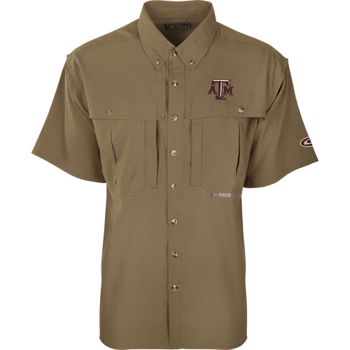 Texas A&M S/S Flyweight Wingshooter shirt with short sleeves, button-up design, visible chest pockets, and a prominent logo, ideal for warm-weather outdoor activities.