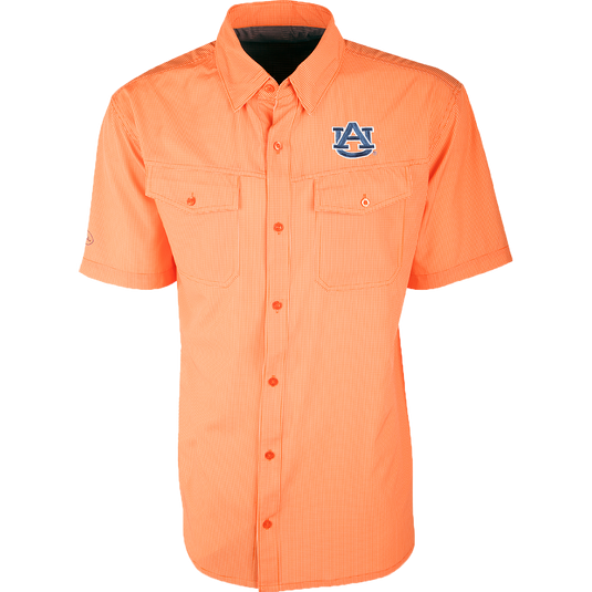 Auburn S/S Traveler's Shirt with logo on left chest, made of lightweight, breathable poly/spandex fabric. Four-way stretch for freedom of movement. Ideal for football games or weekend tailgates. Moisture-wicking, wrinkle-resistant. 2 chest pockets with button flaps.