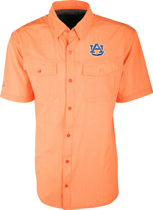 Auburn S/S Traveler's Shirt with logo on lightweight, breathable fabric. Four-way stretch for freedom of movement and wrinkle resistance. Ideal for early season football games or weekend tailgates. Moisture-wicking with 2 chest pockets.