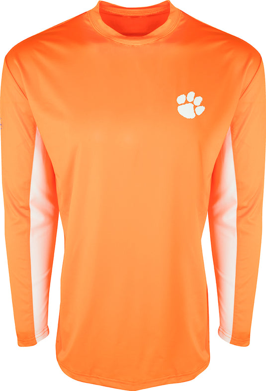 Clemson L/S Performance Crew: Orange shirt with paw print. Built for all-day sun protection and comfort. Breathable mesh on back and underarms. Shield 4™ technology for all-around element protection. Final sale.