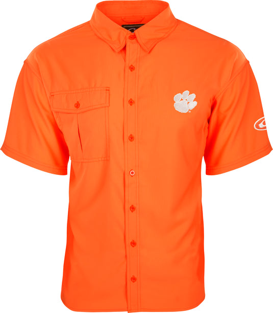 Clemson S/S Flyweight Shirt: Lightweight orange shirt with a paw print. Quick-drying, breathable 100% polyester fabric with UPF 50+ sun protection. Vented mesh back and vertical chest pockets. Ideal for warm-weather outdoor activities.