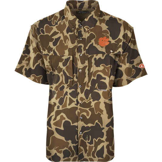 Clemson S/S Flyweight Wingshooter: A lightweight, breathable camouflage shirt with logo. Quick-drying, moisture-wicking, and UPF 50+ sun protection. Vented back design, chest pockets, and a vertical zipper pocket. Ideal for warm-weather outdoor activities.