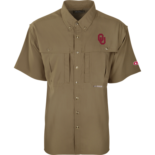 Oklahoma S/S Flyweight Wingshooter shirt with short sleeves, vented back, Magnattach™ vertical chest pocket, and vertical zipper pocket, designed for warm-weather outdoor activities.