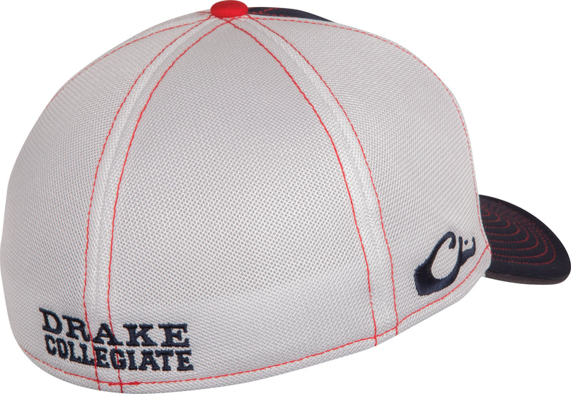 A white stretch-fit cap with a raised team logo on the front. Cool, breathable mesh back with solid color front panels. Available in M/L and XL/2X sizes. Made of cotton. Perfect for Ole Miss fans.
