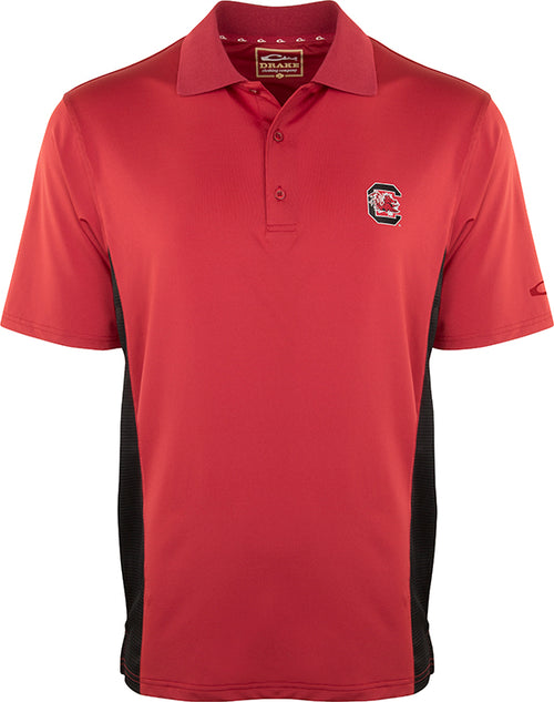 South Carolina Performance Polo with Mesh Sides featuring a red shirt with a logo. Moisture-wicking fabric and mesh panels for breathability.