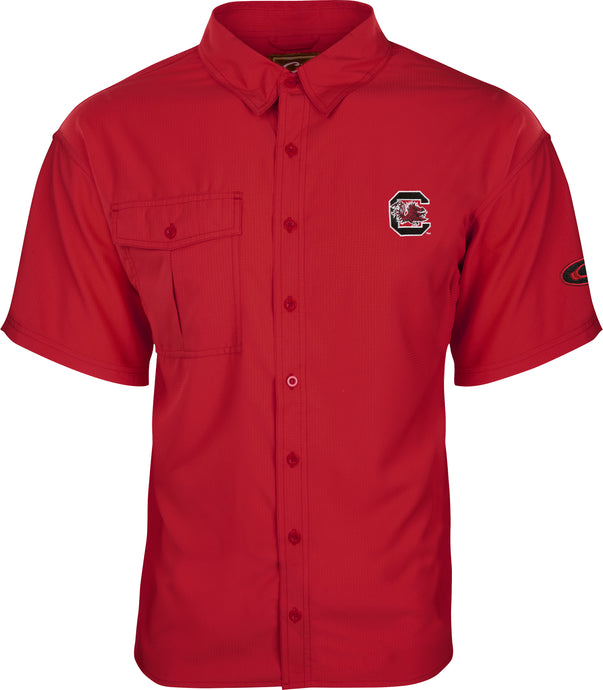 South Carolina S/S Flyweight Shirt: A red shirt with a logo on it, designed for warm-weather outdoor activities. Made of 100% polyester Flyweight fabric for quick drying and breathability. Features include UPF 50+ sun protection, vented mesh back, and vertical chest pockets.