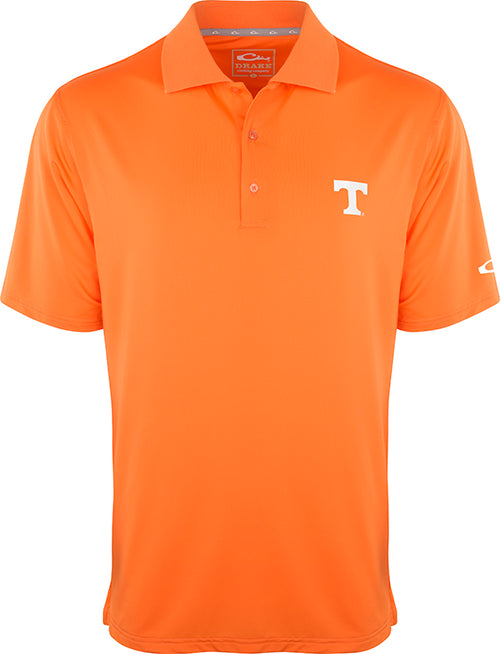 Tennessee Performance Stretch Polo - An orange polo shirt with a white T logo, perfect for the big game or a round of golf. Made of 92% polyester and 8% spandex, it offers four-way stretch, quick-drying, moisture-wicking, and breathability. Official Alabama logo on the left chest.