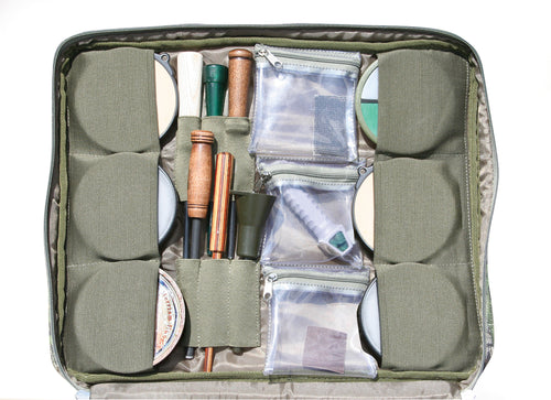 Ol' Tom Treasure Chest: A bag with compartments for turkey calls, tools, and accessories. Perfect for organizing and storing hunting gear.