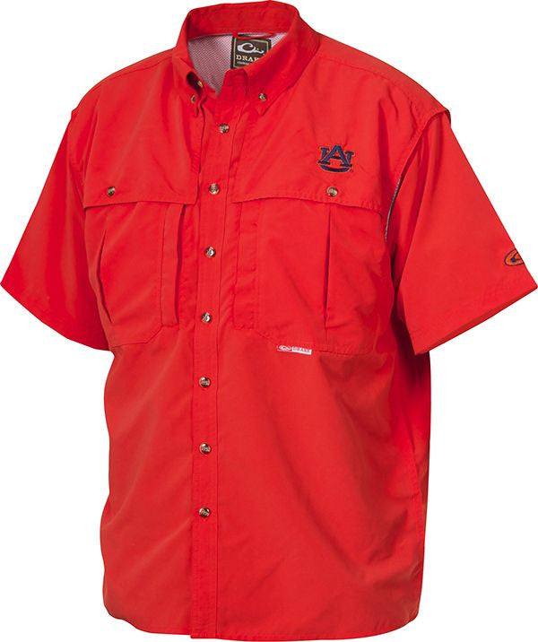 Auburn Wingshooter's Shirt Short Sleeve - Red shirt with logo, perfect for Game Day. Breathable, quick-drying fabric with front and back ventilation. Features Magnattach™ pocket, zippered chest pocket, and oversized chest pockets. Ideal for hunting and outdoor activities.