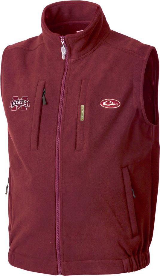 Mississippi State Windproof Layering Vest with logo on right chest. Maroon vest made of windproof, water-resistant fleece. Stand-up collar, zippered pocket, and handwarmer pockets.