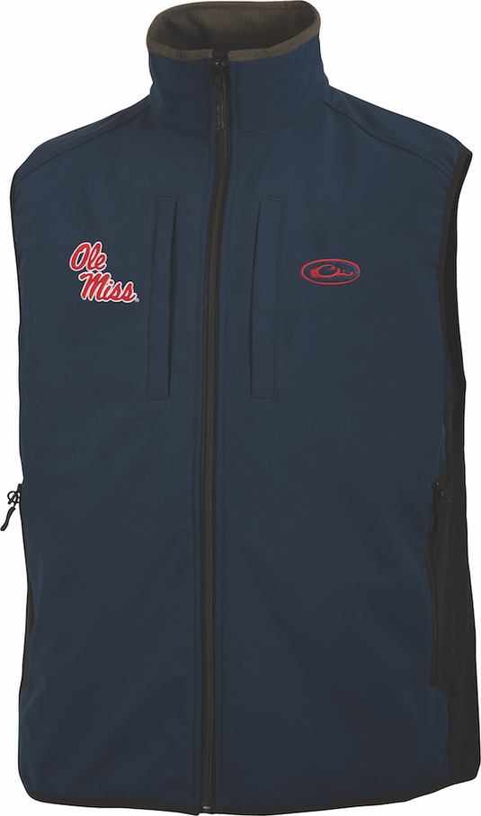 Ole Miss Windproof Tech Vest with logo, featuring vertical Magnattach chest pocket, zippered chest pocket, lower zippered pockets, drawstring waist, and side stretch panels. Made of 100% polyester shell and lining with bonded fleece lining. Ideal for hunting and outdoor activities.