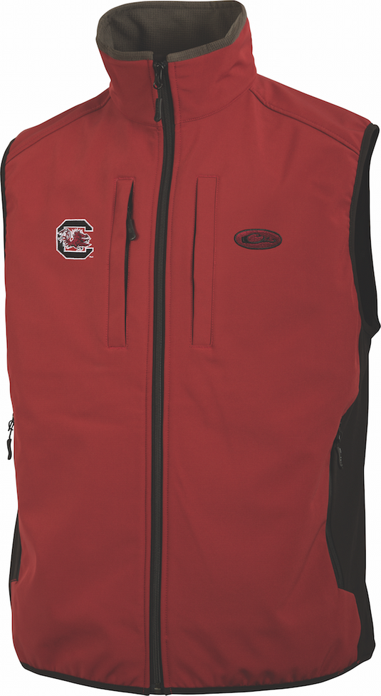 South Carolina Windproof Tech Vest: Red vest with logo. Features Magnattach™ chest pocket, zipper closures, side stretch panels. Made of windproof, water-resistant polyester. Ideal for hunting and outdoor activities.