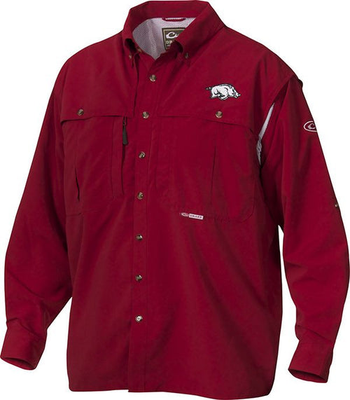 Arkansas Wingshooter's Shirt: A red, long-sleeved shirt made of breathable polyester twill fabric. Features include front and back ventilation, oversized chest pockets, and a vertical zippered pocket. Perfect for Game Day.